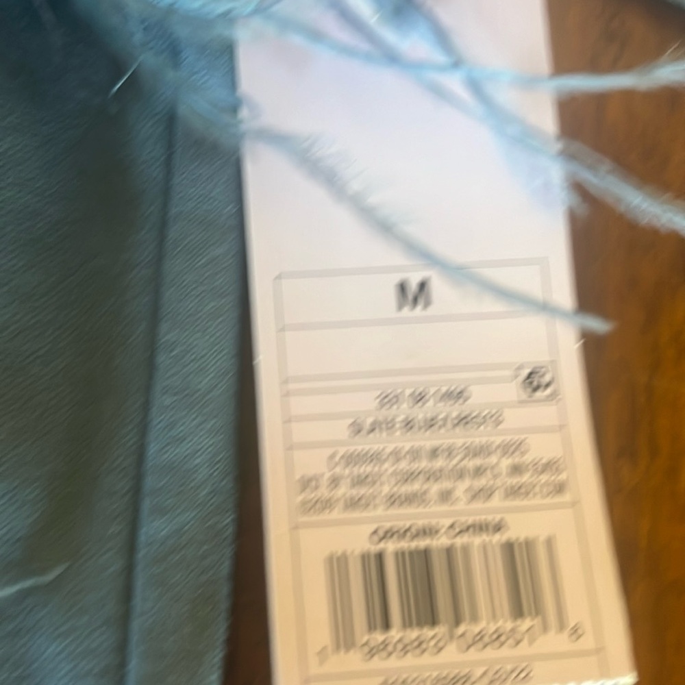 Beautiful blue mini dress with feather trim